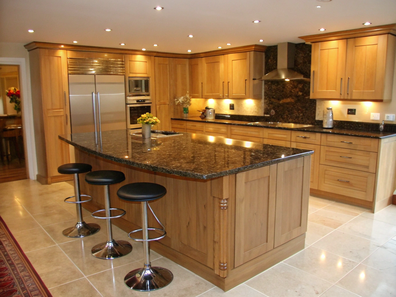 Contemporary sage green island and cabinetry